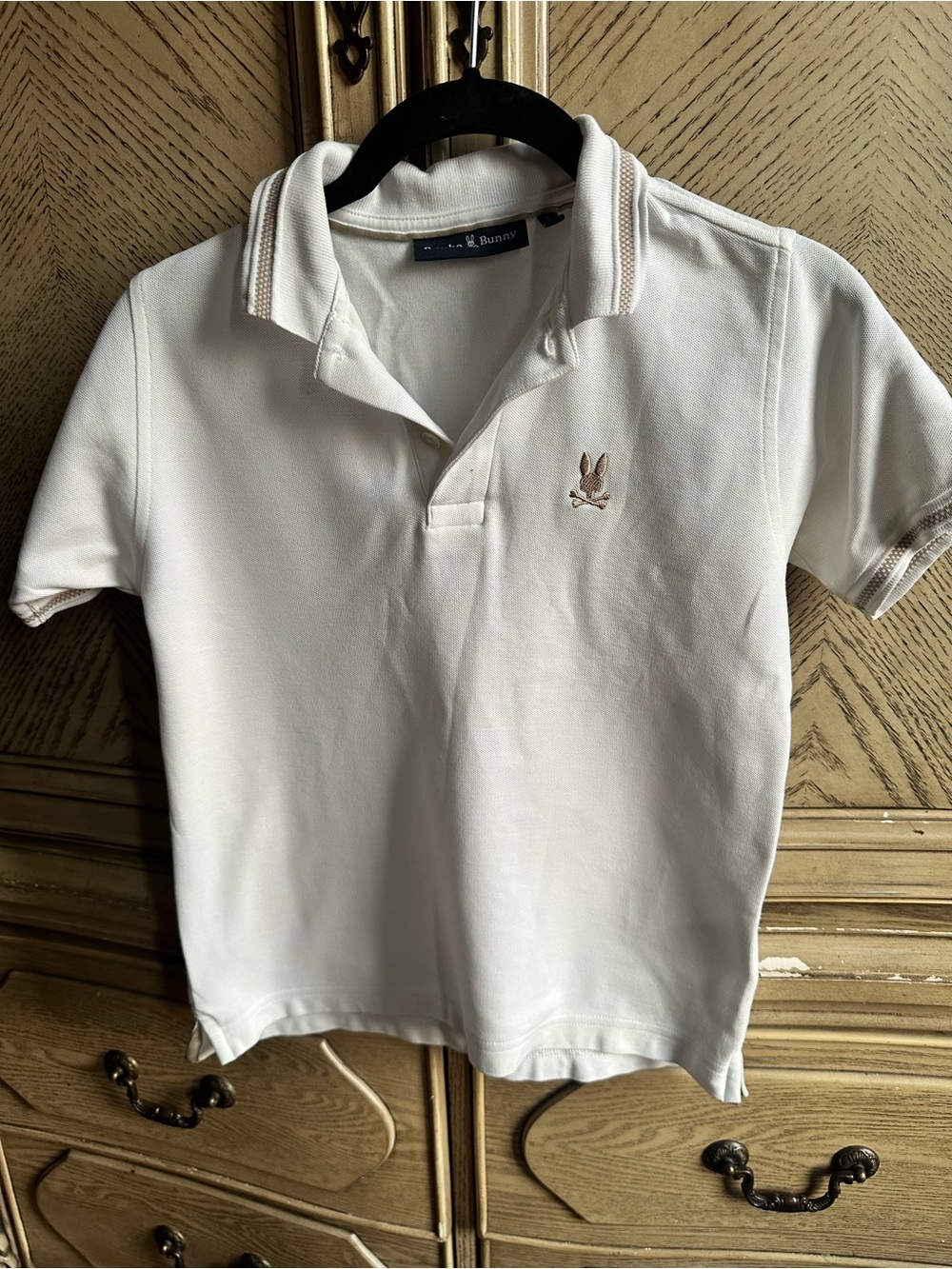 Psycho Bunny White Polo with Subtle Tan Logo Trim